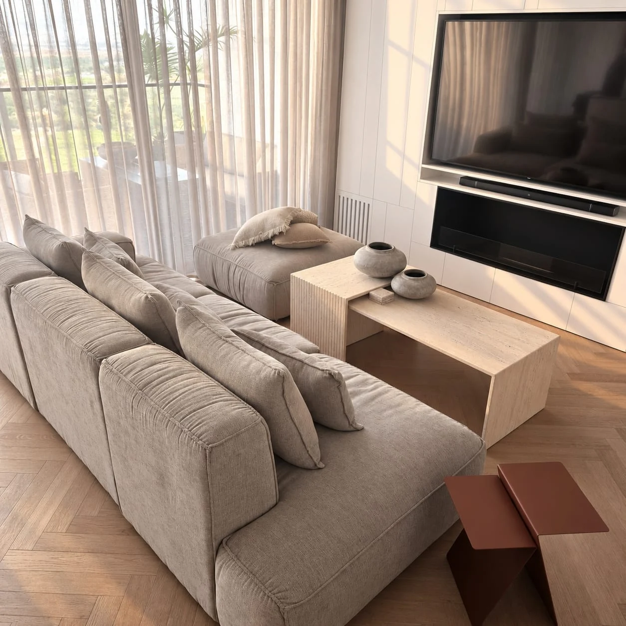 View along the sofa towards the living-room tables and television wall