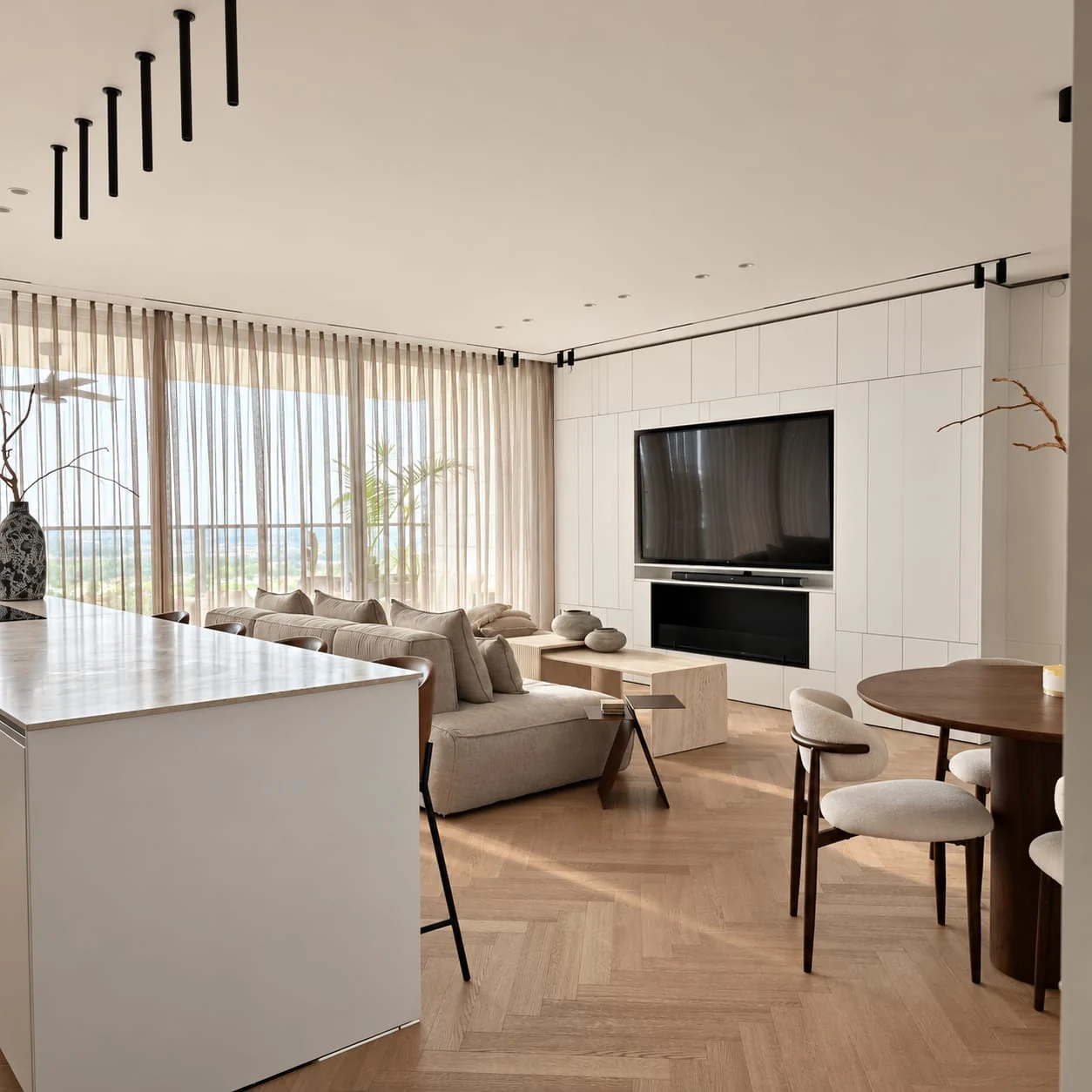 Overview of the kitchen island, living room and dining area