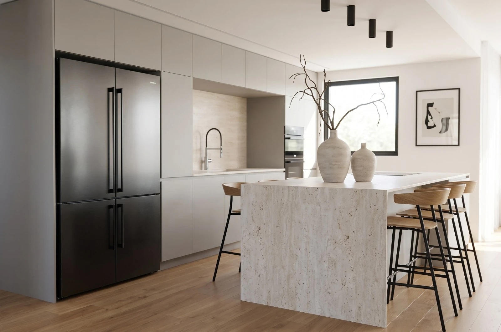 Stone island with ceramic vases, wooden stools and gray cabinetry beneath black ceiling lights.